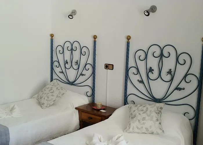 & Restaurante Miralpas *